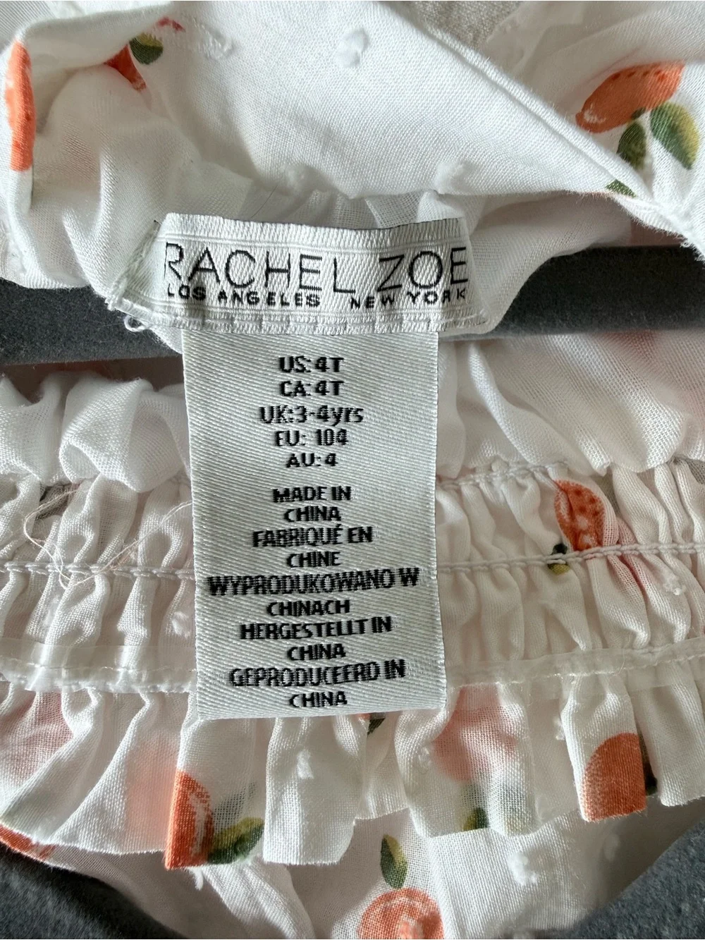Rachel Zoe White Dress with Peach Print and Orange Straw Bag